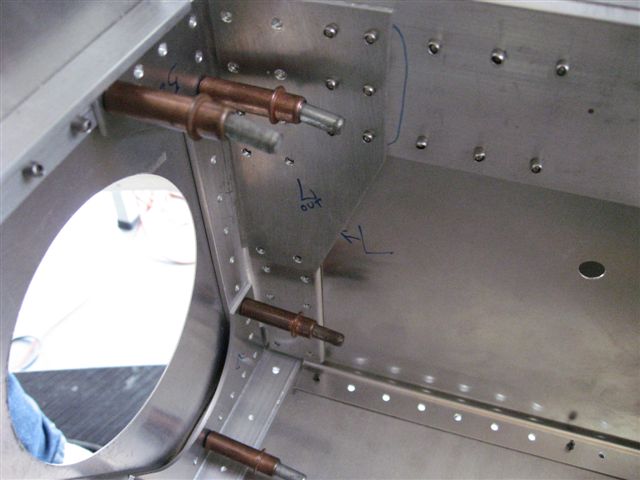 Forward fuselage spar tunnel - rivets not installed until after wings rigged